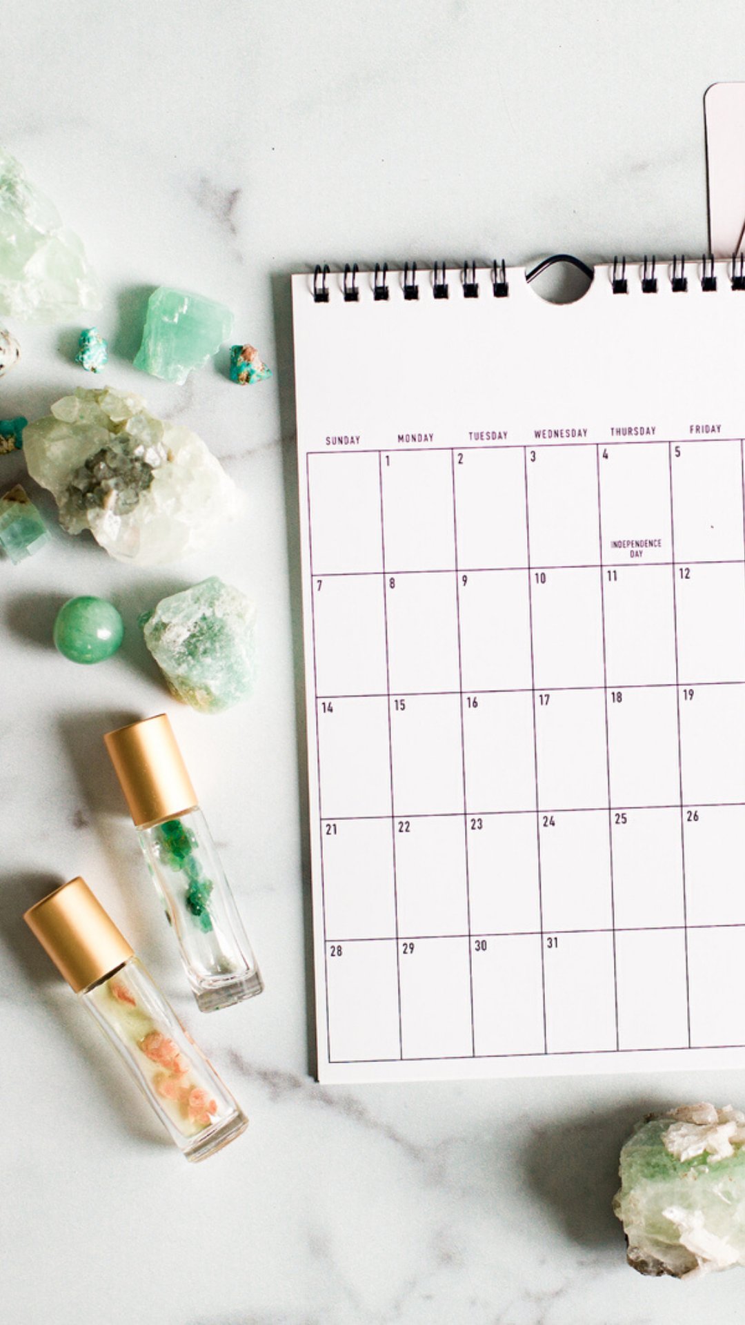 calendar with crystals and essential oils